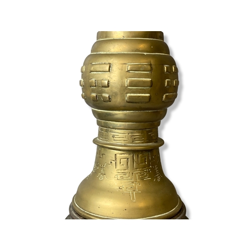 205 - Chinese Bronze / Brass Archaistic type Gu shape vase on stand.
30cm tall.