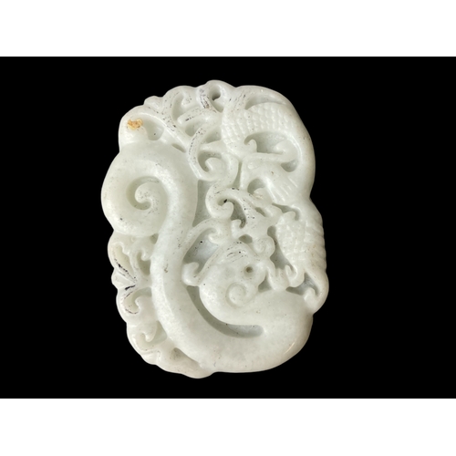 138 - Pair of Chinese carved Jade pendant.
Largest 5 x 3.5cm