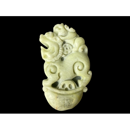 115 - Two Chinese carved Jade token & pendant.
5cm Diameter