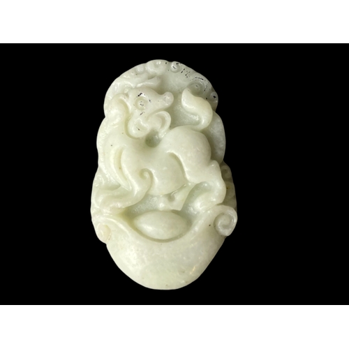 131 - Pair of Chinese carved Jade pendants.
Disc - 4.7cm diameter