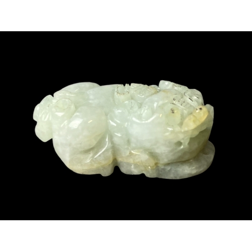 116 - Chinese carved jade Lion pendant.
3cm long.