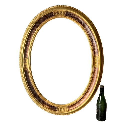 32 - Large Oval Gilt Framed Mirror.
87 x 67cm