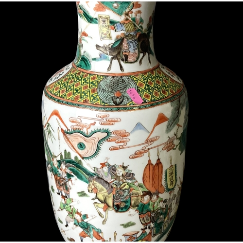 187 - A large pair of Qing dynasty Famille verte porcelain vases. Hand painted with extensive battle scene... 