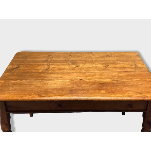 2 - Antique Victorian Pine breakfast table. Fitted with large drawers to either end. Turned legs.
122 x ... 