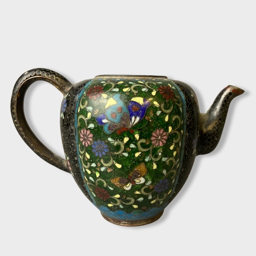 127 - A late 19th century (Meiji period) Japanese Cloisonne teapot.
8 x 13 cm 
Missing lid