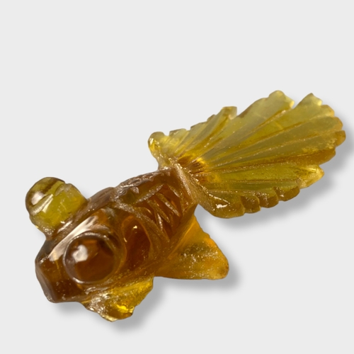 144 - Four Chinese Amber glass fish figures & a tortoise.
Tortoise - 4 x2 cm