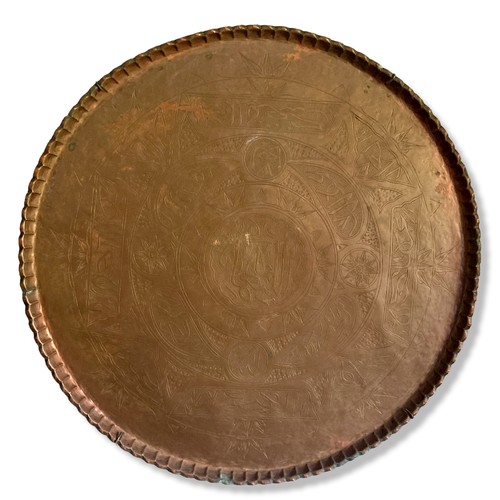 62 - A large Persian / Arabic engraved Copper wall plaque. 
64 cm Diameter