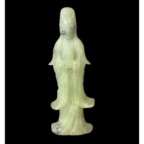 72 - A Chinese carved Jade Guanyin figure. 
17cm tall