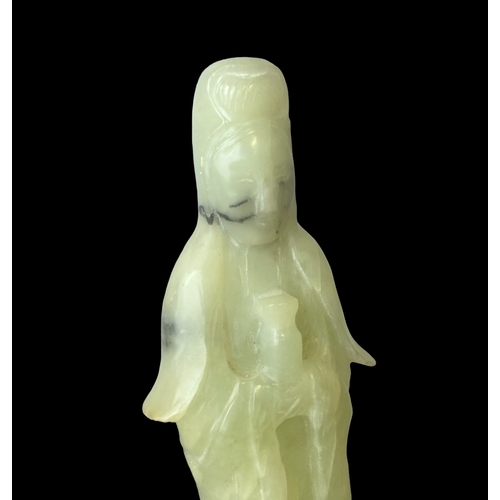 72 - A Chinese carved Jade Guanyin figure. 
17cm tall