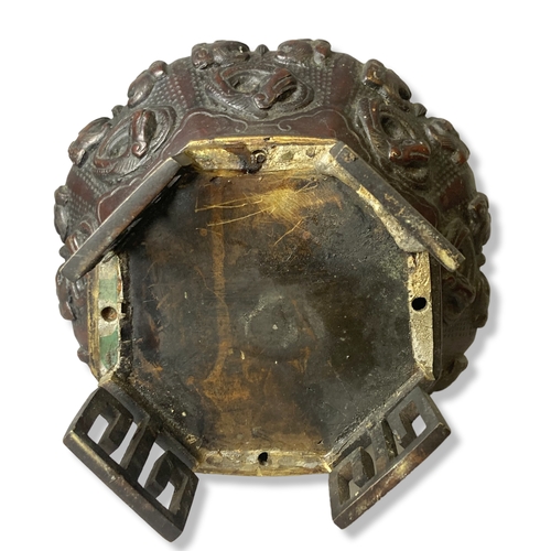 77 - A 19th-century Japanese Bronze vase. Raised on greek-key feet, with relief decorated Dragons & Phoen... 