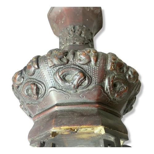 77 - A 19th-century Japanese Bronze vase. Raised on greek-key feet, with relief decorated Dragons & Phoen... 