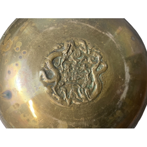 96 - Three Chinese engraved Brass bowls.