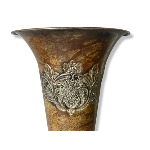 97 - A bronzed metal trumpet vase. Stylised design.