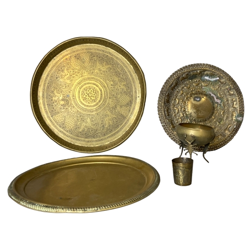 101 - A collection of North Indian / Persian brass trays etc.