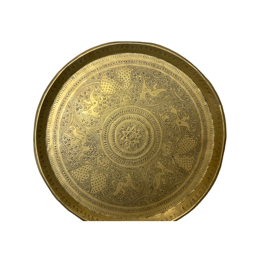 101 - A collection of North Indian / Persian brass trays etc.