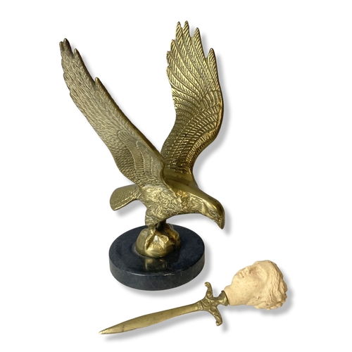 102 - A vintage Brass & marble Eagle desk paperweight, together with a letter opener. 
Eagle stands 24cm t... 