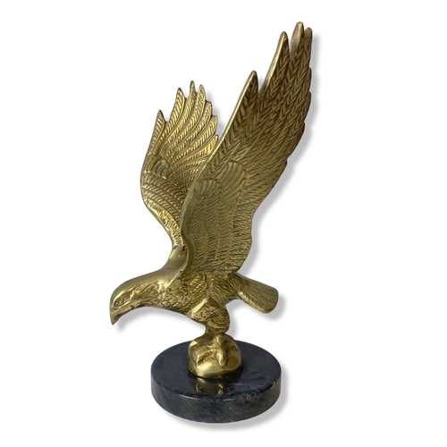 102 - A vintage Brass & marble Eagle desk paperweight, together with a letter opener. 
Eagle stands 24cm t... 