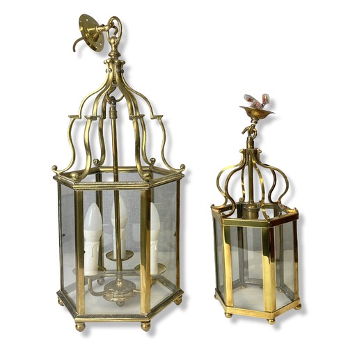 106 - Two Georgian type Polished Brass Hall lanterns. One with three branch lights inset hexagonal glass p... 
