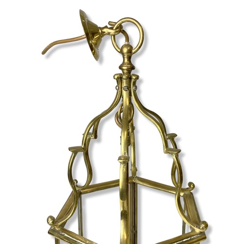 106 - Two Georgian type Polished Brass Hall lanterns. One with three branch lights inset hexagonal glass p... 