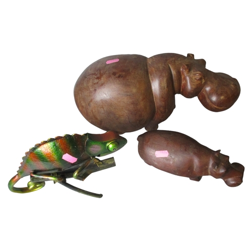 107 - Two Wooden Carved African Hippopotamuses and a metal Chameleon