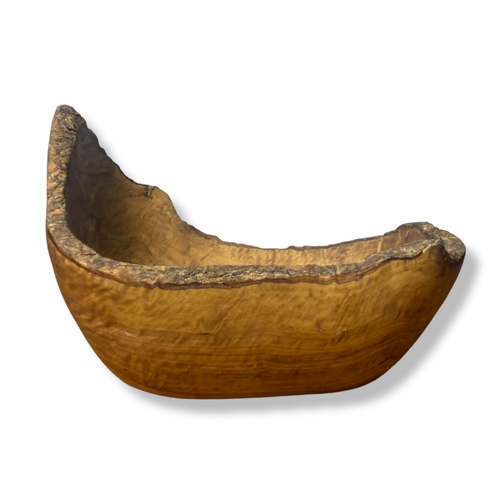 112 - A job lot of Tribal Art, including a Zulu shield set, large Olive wood bowl and metal Giraffe.