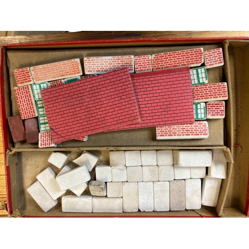 117 - Four boxed early 20th C Lotts Lodomo Tutor building blocks.