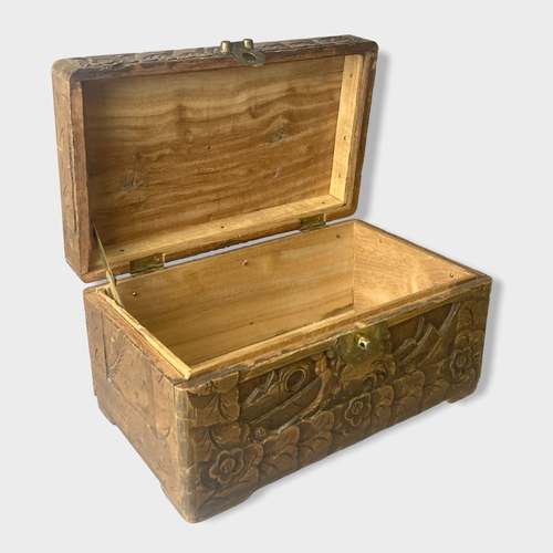 123 - A Chinese carved Camphor wood Box.
24 x 14 x 13cm