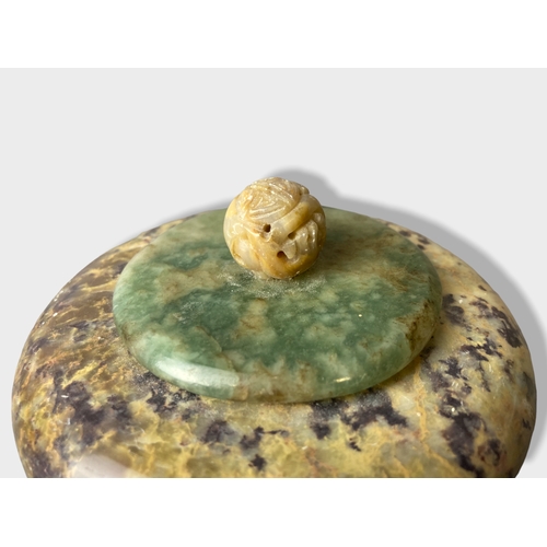 134 - A Chinese Stone and Jade trinket / powder Box.
8 x 11cm