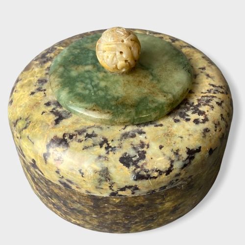 134 - A Chinese Stone and Jade trinket / powder Box.
8 x 11cm