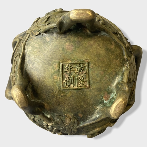 168 - A Chinese Bronze tripod censer with stand & cover.
Relief decorated with Grape vines and rats. 
Four... 