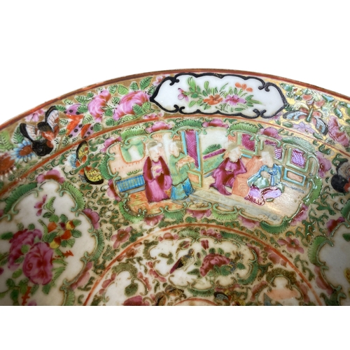 215 - A 19th-century Chinese Famille Rose Canton fruit bowl. Together with smaller, similar example. 
larg... 