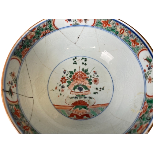 218 - A collection of Chinese export porcelain fruit bowls, Mug and a saucer.
Mainly damaged or repaired.