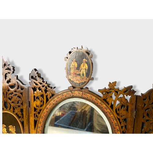 94 - A 19th Century Sorrento Ware walnut wall mirror, the hinged fretwork panels inlaid with figurative v... 