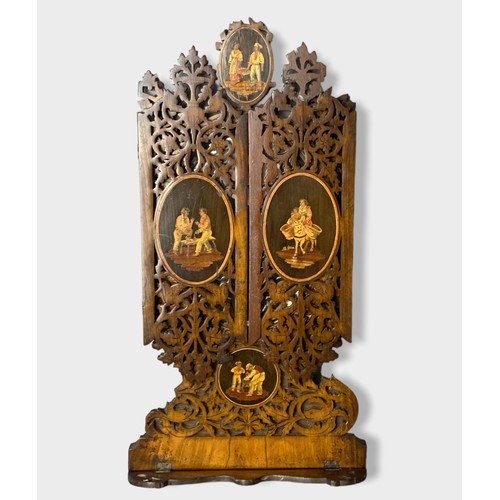 94 - A 19th Century Sorrento Ware walnut wall mirror, the hinged fretwork panels inlaid with figurative v... 