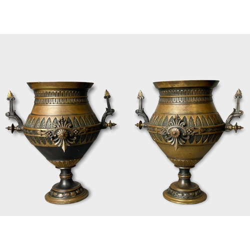 206 - A Pair of 19th century French Aesthetic movement Bronze garniture vases. 
22 x 20 cm