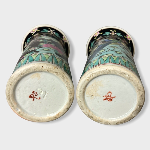 154 - A pair of Japanese Yamatoku porcelain sleeve vases. Black ground with painted enamels with exotic bi... 