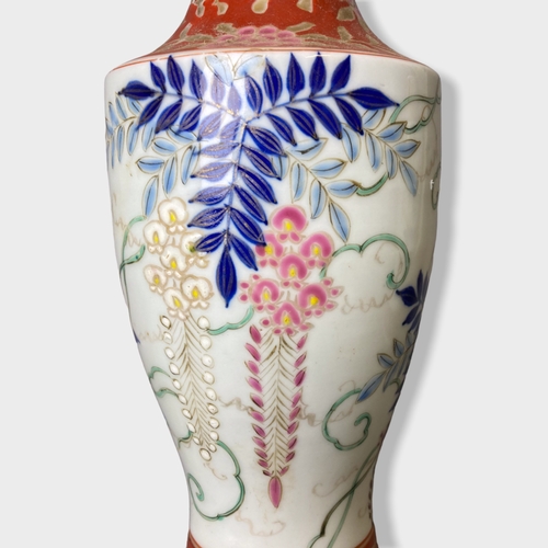 155 - A pair of Japanese porcelain hand painted enamels vases. 
20cm Tall.