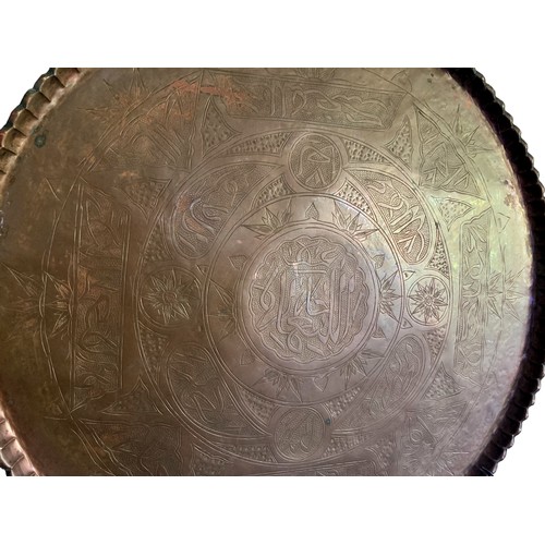 178 - A large Persian / Arabic engraved Copper wall plaque. 
64 cm Diameter