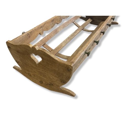 20 - A vintage wooden rocking Crib.