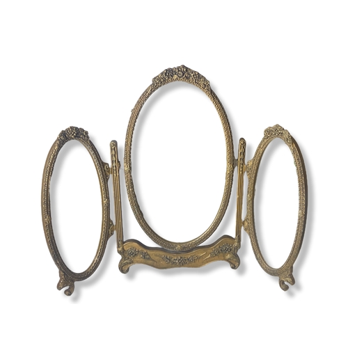 23 - A gilded tri-fold Travel Dresser Mirror.