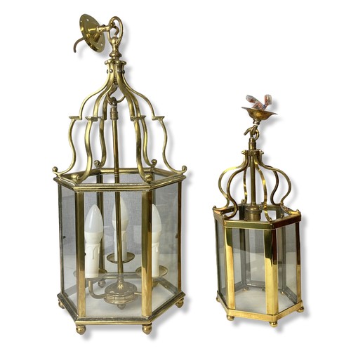 196 - Two Georgian type Polished Brass Hall lanterns. One with three branch lights inset hexagonal glass p... 