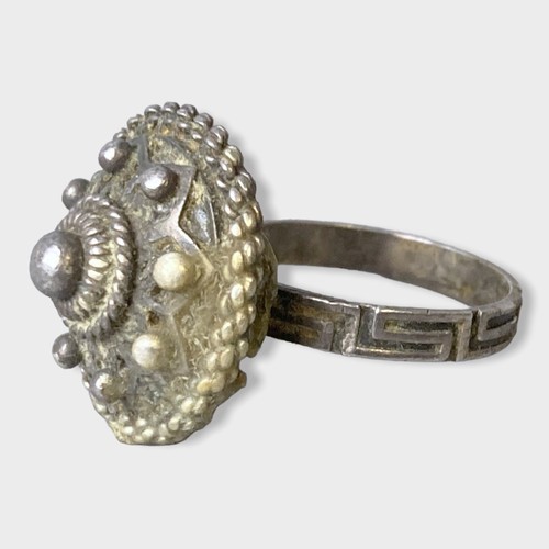 65 - A vintage Silver greek style ring and similar bangle.