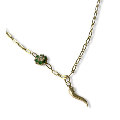 79 - An 18Ct Gold, Diamond & Emerald necklace and pendant. A central flower shape pendant, with a round-c... 