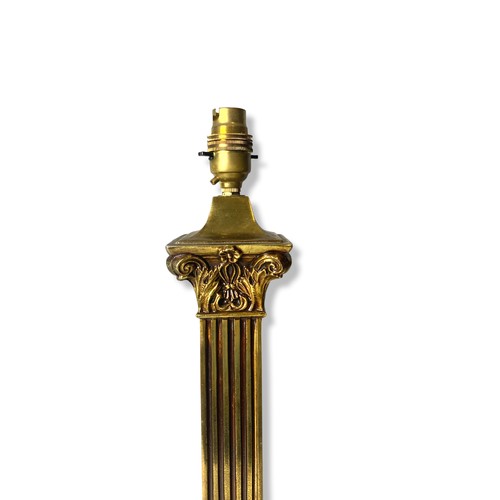 190 - A large Brass Corinthian Column table lamp, with stylised floral motif.
54cm Tall