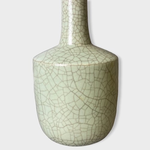 210A - A Chinese Longquan Celadon Mallet / Kinuta vase.
Crackle glazed. 
24cm Tall