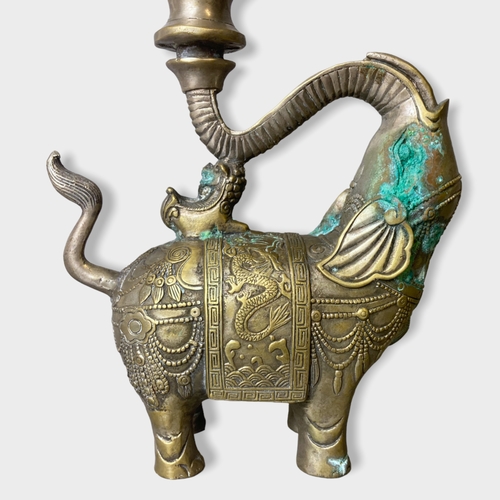 168A - A pair of Chinese metal Elephant candlesticks.
31.5cm