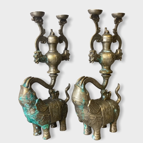 168A - A pair of Chinese metal Elephant candlesticks.
31.5cm