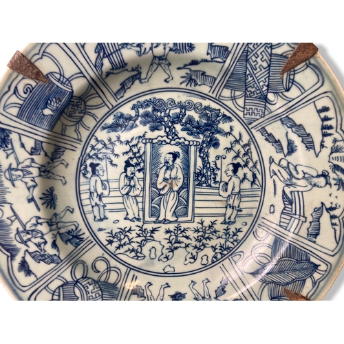 210B - A Chinese porcelain Kraak type metal mounted dish. 
Painted with central scene, bordered with Panels... 