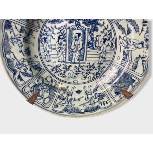 210B - A Chinese porcelain Kraak type metal mounted dish. 
Painted with central scene, bordered with Panels... 