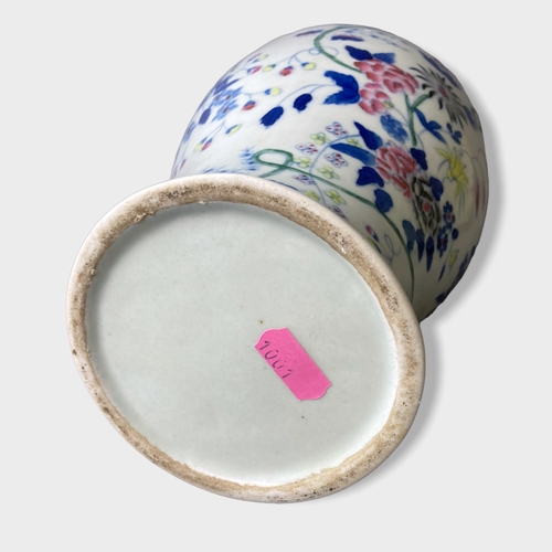 58 - A pair of Chinese hand painted porcelain vases.
Painted with stylised blossoming floral motif. 
Unma... 